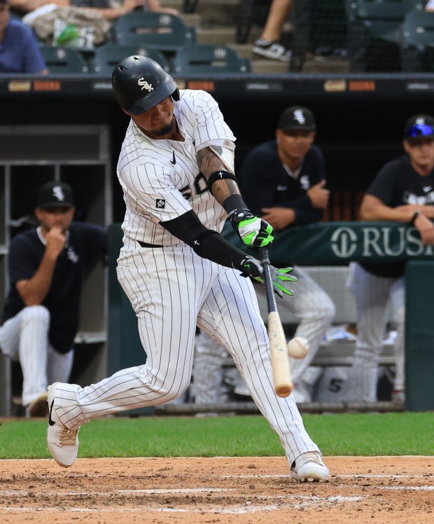 White Sox second baseman Lenyn Sosa connects for an RBI single against the Phillies in the seventh inning at Rate Field on July 30, 2025, in Chicago. (John J. Kim/Chicago Tribune)