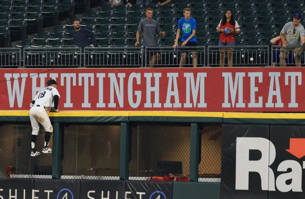 White Sox right fielder Mike Tauchman (18) watches a home run ball by Phillies center fielder Brandon Marsh fly over the visitors bullpen in the ninth inning at Rate Field on July 30, 2025, in Chicago. (John J. Kim/Chicago Tribune)