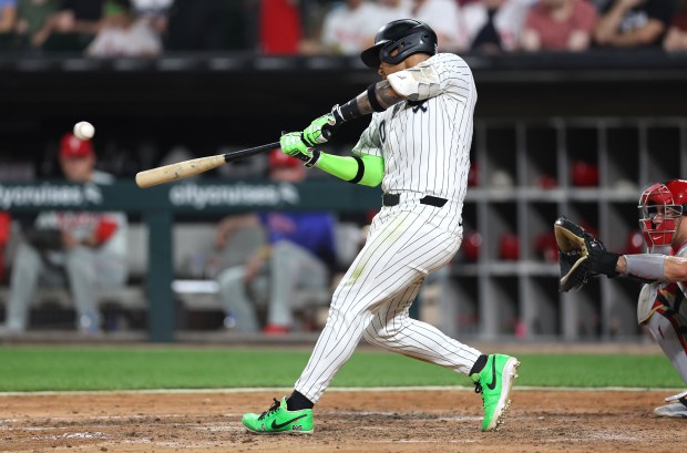 Chicago White Sox second baseman Lenyn Sosa hits a two-run home run in the ninth inning of a game against the Philadelphia Phillies at Rate Field in Chicago on July 29, 2025. (Chris Sweda/Chicago Tribune)