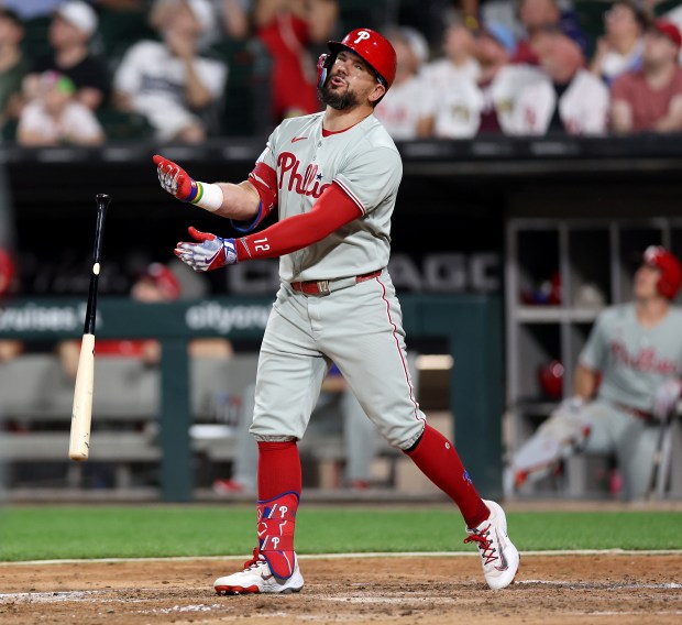 Philadelphia Phillies designated hitter Kyle Schwarber lets go of his bat as he flies out in the ninth inning of a game against the Chicago White Sox at Rate Field in Chicago on July 29, 2025. (Chris Sweda/Chicago Tribune)