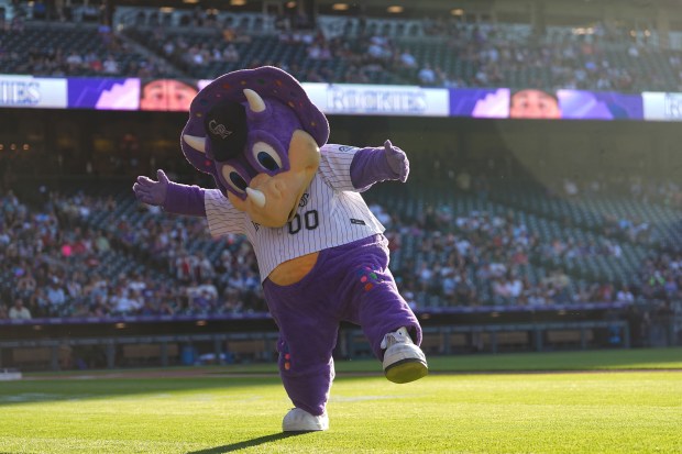 Rockies mascot Dinger in the first inning of a game on June 21, 2025, in Denver. (AP Photo/David Zalubowski)