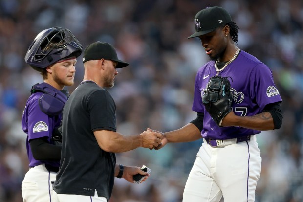 Rockies manager Warren Schaeffer relieves pitcher Angel Chivilli in the sixth inning at Coors Field on July 2, 2025, in Denver. (Photo by Matthew Stockman/Getty Images)