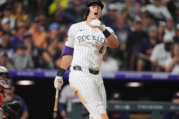 Rockies' Michael Toglia reacts after striking out against the Astros in the eighth inning on July 1, 2025, in Denver. (AP Photo/David Zalubowski)