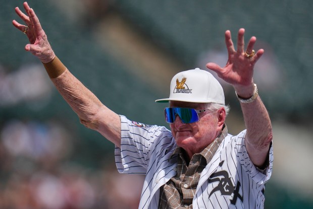 Ken Harrelson, former play-by-play broadcast announcer for the Chicago White Sox, is acknowledged during a ceremony honoring the 2005 World Series Champions on July 12, 2025, in Chicago. (AP Photo/Erin Hooley)