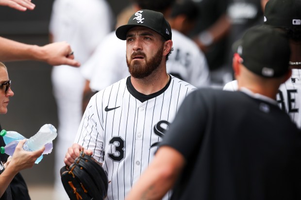 Chicago White Sox pitcher Aaron Civale (43) gets high-fives after getting out of the first inning against the Cleveland Guardians at Rate Field on Sunday, July 13, 2025. (Eileen T. Meslar/Chicago Tribune)