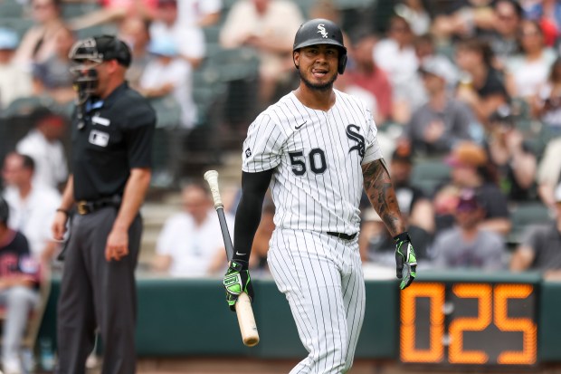 Chicago White Sox second base Lenyn Sosa (50) walks to the dugout after striking out swinging in the second inning against the Cleveland Guardians at Rate Field on Sunday, July 13, 2025. (Eileen T. Meslar/Chicago Tribune)