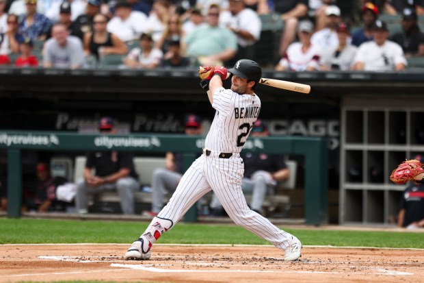 Chicago White Sox outfielder Andrew Benintendi (23) hits a single in the second inning against the Cleveland Guardians at Rate Field on Sunday, July 13, 2025. (Eileen T. Meslar/Chicago Tribune)