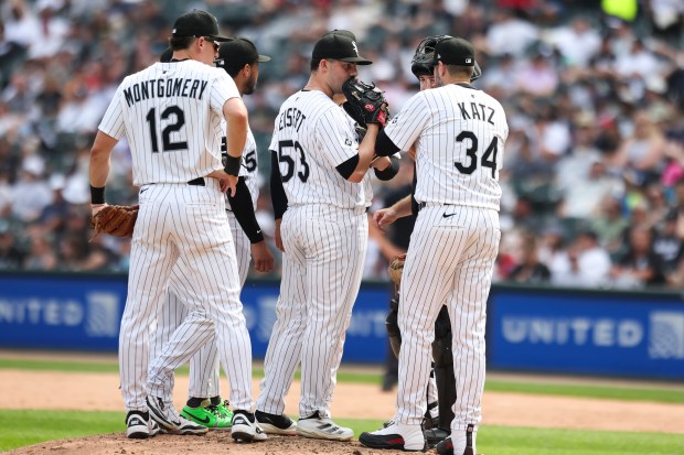 Chicago White Sox pitching coach Ethan Katz speaks to pitcher Brandon Eisert (53) in the tenth inning against the Cleveland Guardians at Rate Field on Sunday, July 13, 2025. (Eileen T. Meslar/Chicago Tribune)