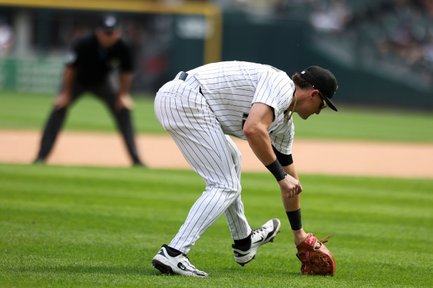 Chicago White Sox shortstop Colson Montgomery (12) misplays the ball in the tenth inning against the Cleveland Guardians at Rate Field on Sunday, July 13, 2025. (Eileen T. Meslar/Chicago Tribune)