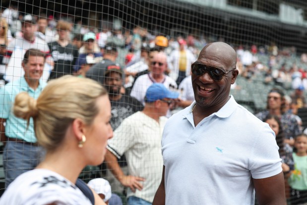Former Chicago White Sox pitcher José Contreras laughs as he stands on the field before the game against the Cleveland Guardians at Rate Field on Sunday, July 13, 2025. (Eileen T. Meslar/Chicago Tribune)