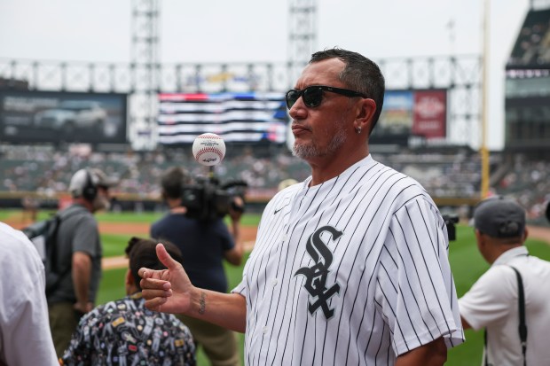 Former Chicago White Sox pitcher Freddy Garcia tosses a ball up before the game against the Cleveland Guardians at Rate Field on Sunday, July 13, 2025. (Eileen T. Meslar/Chicago Tribune)