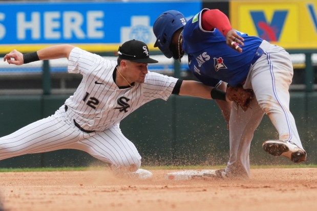 White Sox shortstop Colson Montgomery, left, tags out the Blue Jays' Vladimir Guerrero Jr. at second during the sixth inning on Wednesday, July 9, 2025, at Rate Field. (Nam Y. Huh/AP)