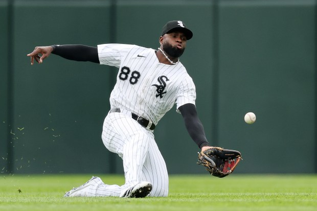 White Sox center fielder Luis Robert Jr. makes a sliding catch against the Blue Jays during the fourth inning on July 9, 2025, at Rate Field. (Michael Reaves/Getty Images)
