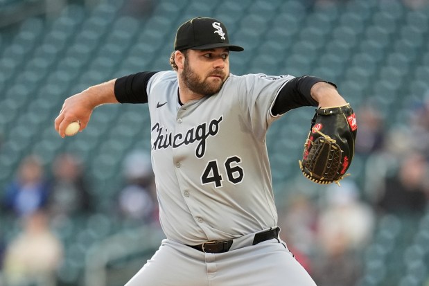 Chicago White Sox starting pitcher Bryse Wilson (46) delivers during the first inning of a baseball game against the Minnesota Twins, Wednesday, April 23, 2025, in Minneapolis. (AP Photo/Abbie Parr)