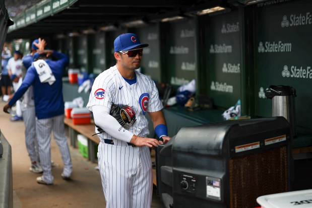 Cubs outfielder Seiya Suzuki cools himself in the dugout before the game against the Kansas City Royals at Wrigley Field, July 23, 2025. (Eileen T. Meslar/Chicago Tribune)