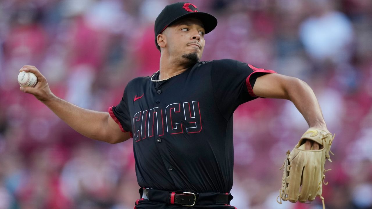 Cincinnati Reds pitcher Chase Burns throws during the first inning of a baseball game against the Colorado Rockies in Cincinnati, Friday, July 11, 2025.