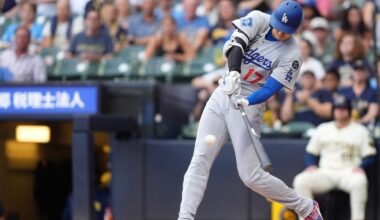 Los Angeles Dodgers' Shohei Ohtani hits a solo home run during the first inning of a baseball game against the Milwaukee Brewers, Tuesday, July 8, 2025, in Milwaukee. (AP Photo/Aaron Gash)