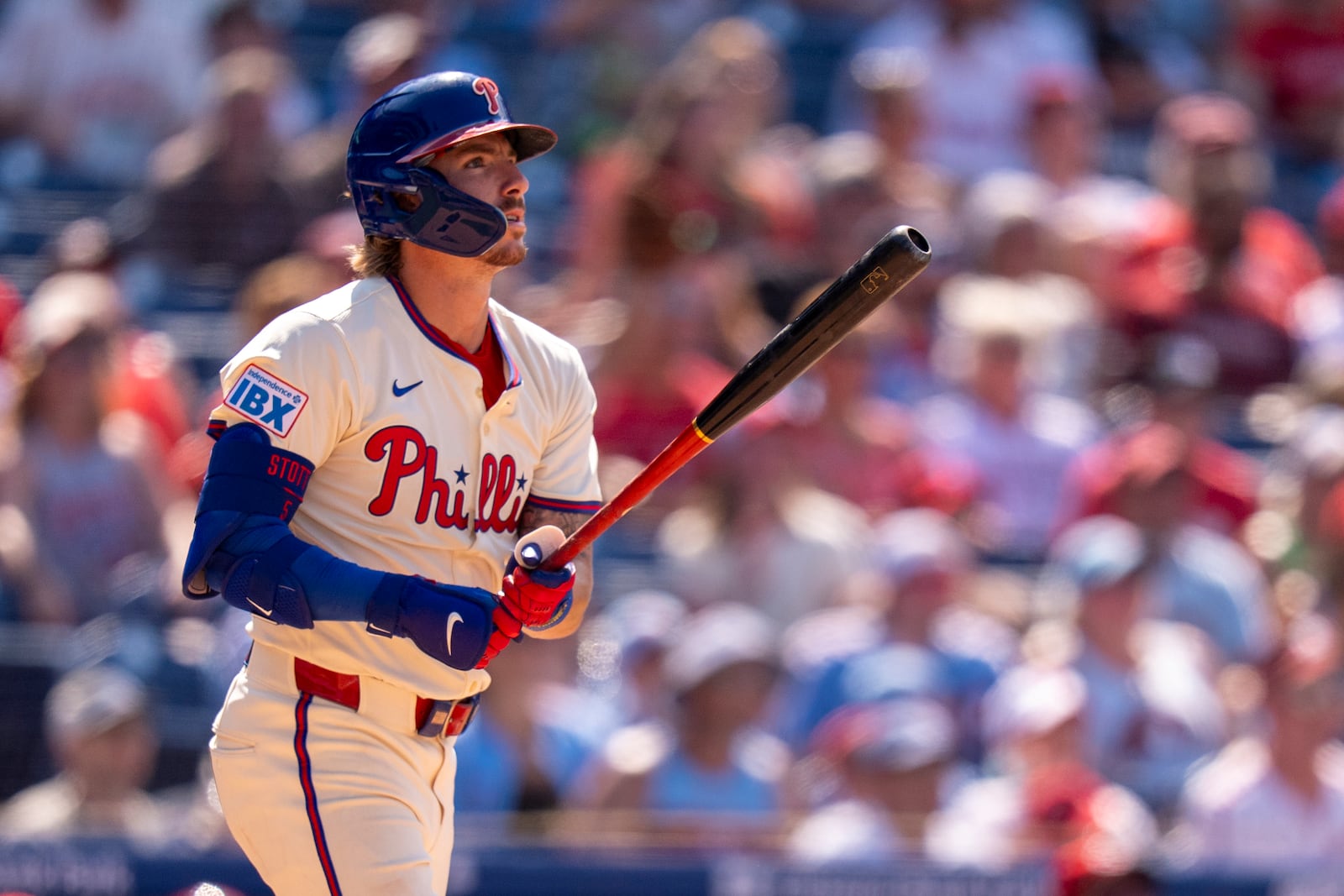Philadelphia Phillies' Bryson Stott watches his two-run home run during the eighth inning of a baseball game against the Cincinnati Reds, Sunday, July 6, 2025, in Philadelphia. (AP Photo/Chris Szagola)