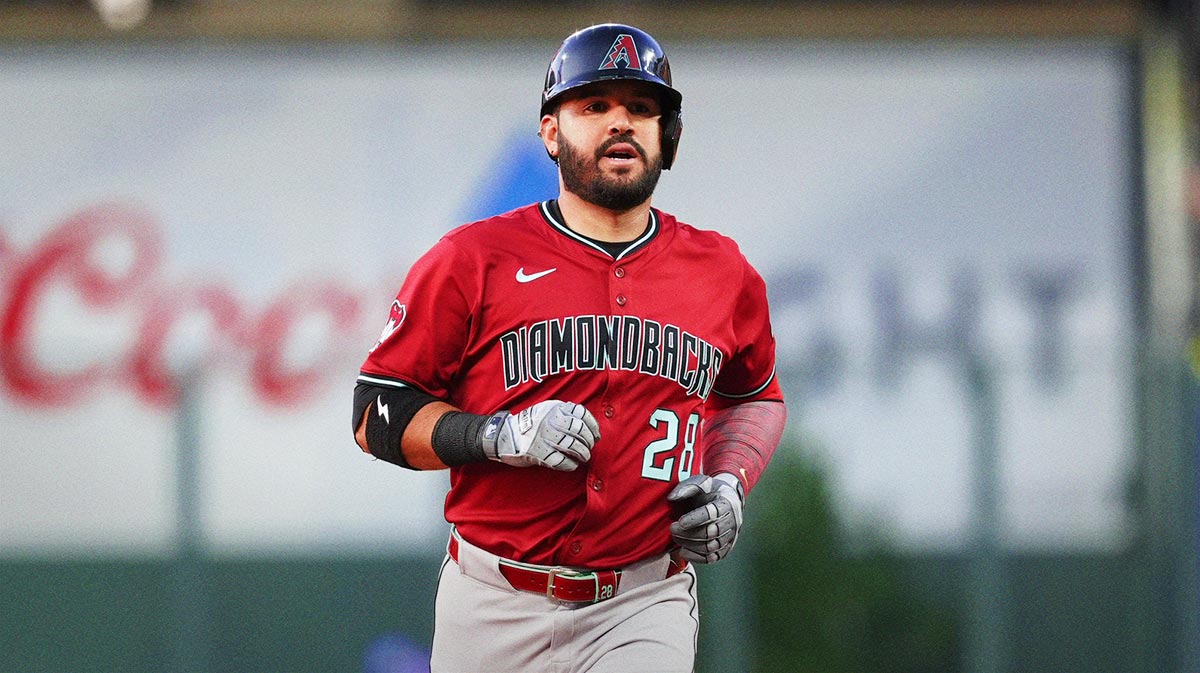 Arizona Diamondbacks third baseman Eugenio Suarez (28) runs off a solo home run in the fifth inning against the Colorado Rockies at Coors Field.