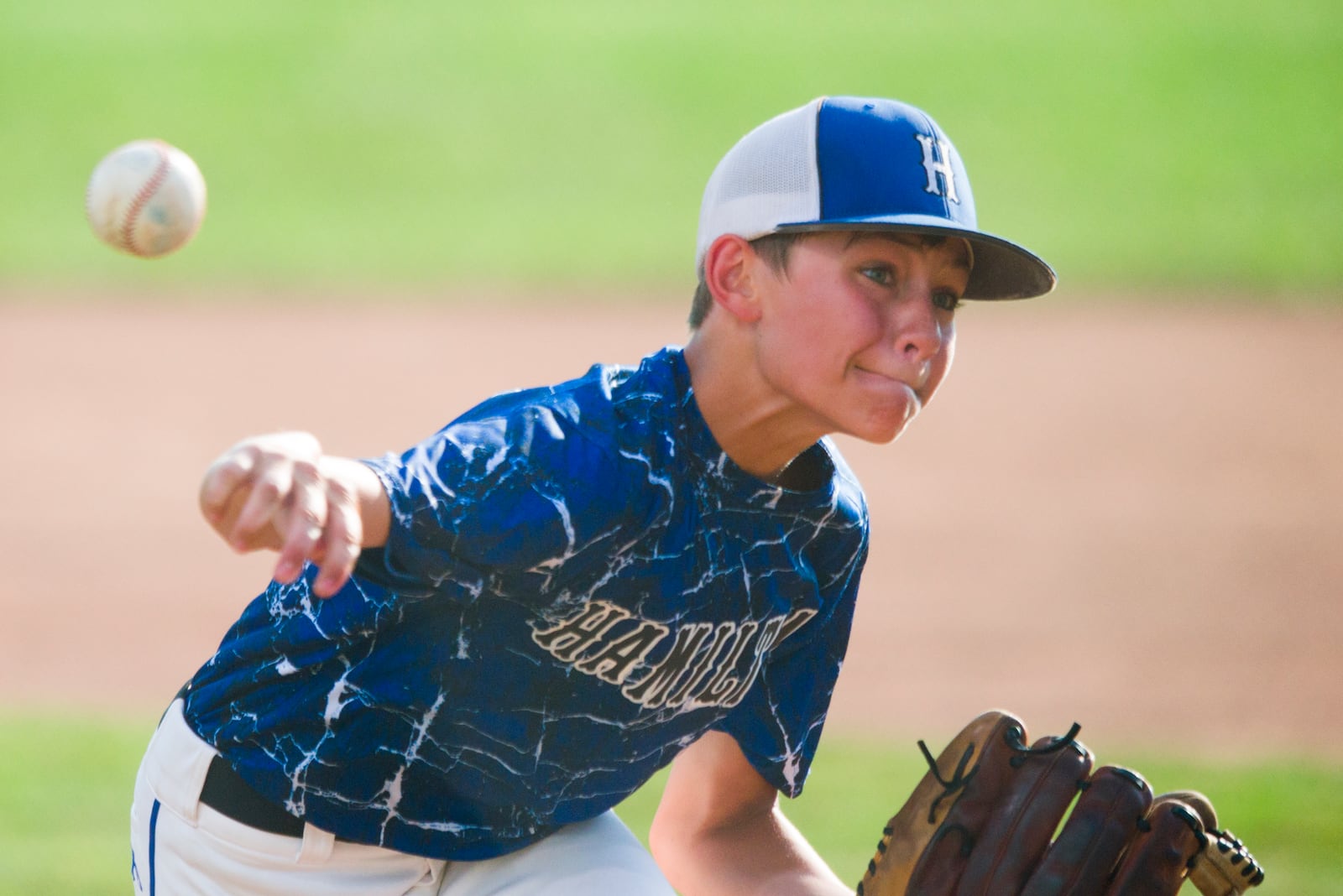 Hamilton West Side Little Leaguer Landyn Vidourek (4) delivers a pitch during action in the International Little League Great Lakes Regional Tournament in Indianapolis, Thursday, August 11, 2016. Hamilton West Side was eliminated from the tournament as Essexville Hampton (Mich.) won the game, 1-0.