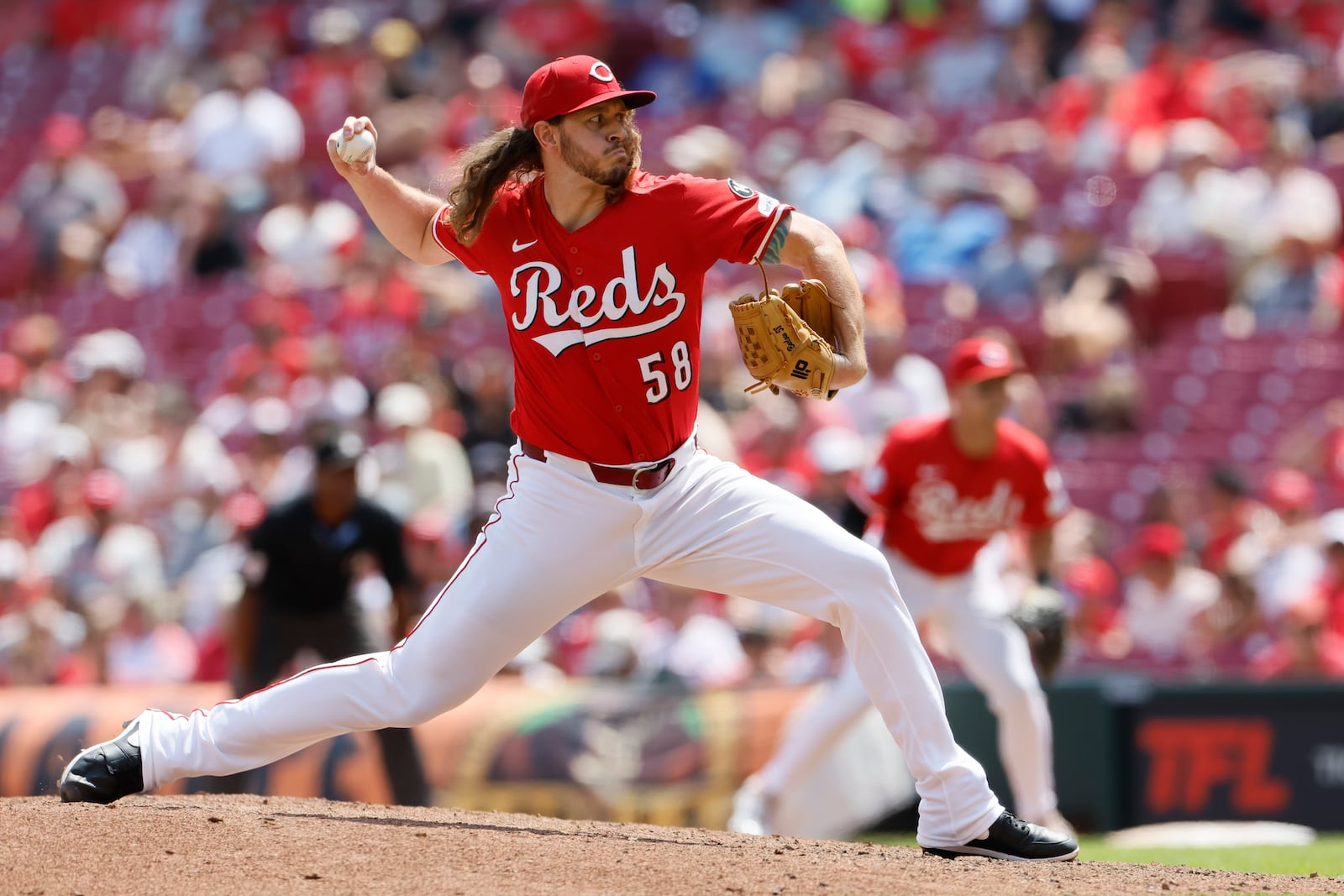 Cincinnati Reds relief pitcher Scott Barlow throws against the Colorado Rockies during the sixth inning of a baseball game, Sunday, July 13, 2025, in Cincinnati. (AP Photo/Jay LaPrete)