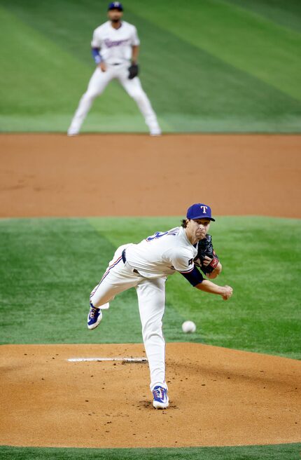 Texas Rangers pitcher Jacob deGrom (48) hurls a first inning pitch to the Oakland Athletics...