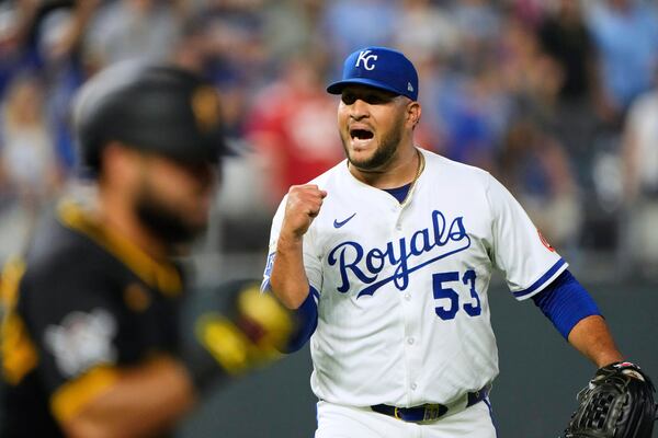 Kansas City Royals relief pitcher Carlos Estevez celebrates after a baseball game against the Pittsburgh Pirates, Wednesday, July 9, 2025, in Kansas City, Mo. (AP Photo/Charlie Riedel)
