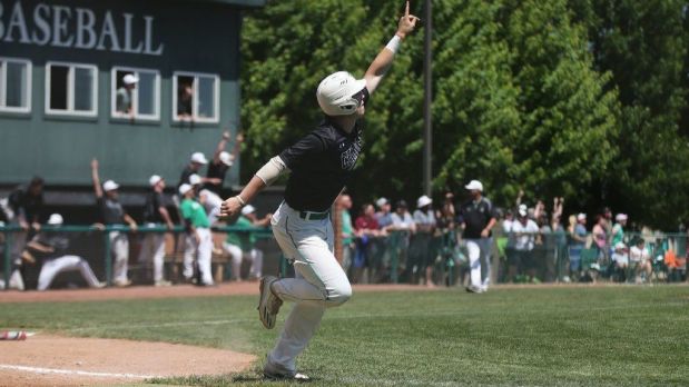 Providence's Dakota Kotowski watches his home run head over the left-field fence against Sandburg during a Class 4A regional championship game on Saturday, May 26, 2018.