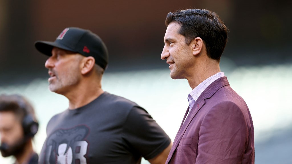 Diamondbacks' Torey Lovullo (left) and Mike Hazen (right)...