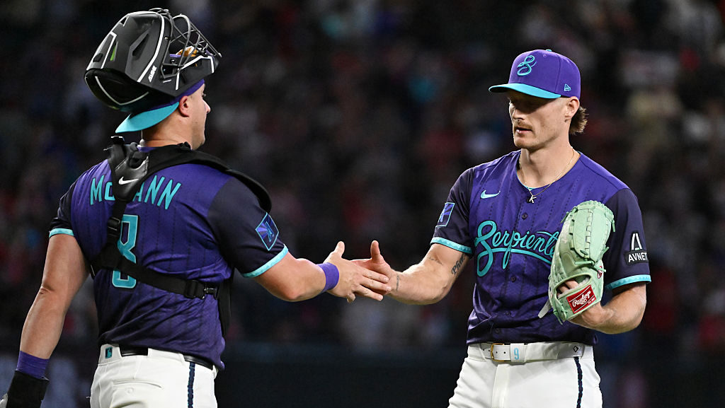 Shelby Miller #18 and James McCann #8 of the Arizona Diamondbacks...