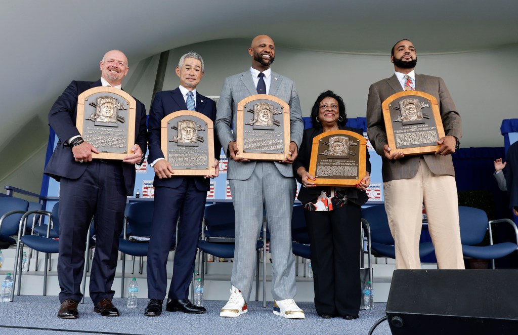 Inductees, from left, Billy Wagner, Ichiro Suzuki, CC Sabathia, Willa Allen, representing her late husband late Dick Allen and David Parker II, representing his late father Dave Parker pose for a photograph after  the Baseball Hall of Fame induction ceremony at Clark Sports Center on July 27, 2025 in Cooperstown, New York. 