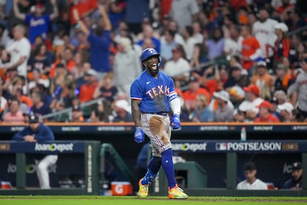 Texas Rangers right fielder Adolis Garcia (53) celebrates after hitting a home run during...
