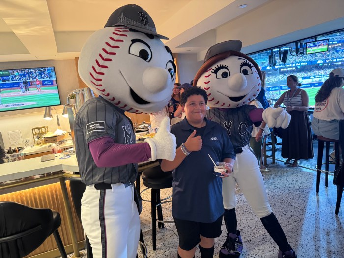 Antonio Veneziano with Mr. and Mrs. Met on the day that he announced an inning of. baseball on SNY.