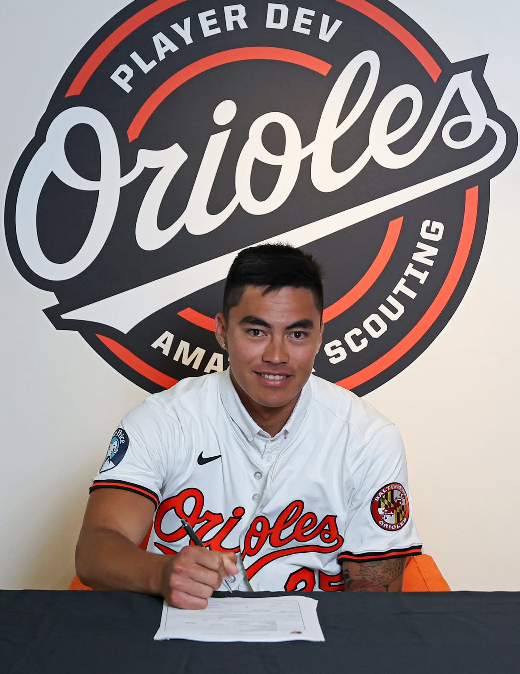 Wehiwa Aloy, a Baldwin High School graduate, signs his first professional baseball contract on Saturday. Aloy is the first-round Major League Baseball draft choice ever from Maui. Baltimore Orioles photo