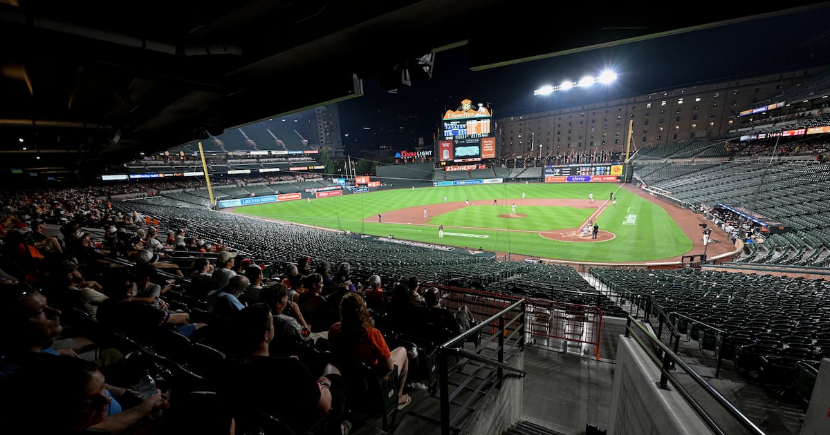 Why did the Orioles and Rockies keep playing after fans evacuated seats?