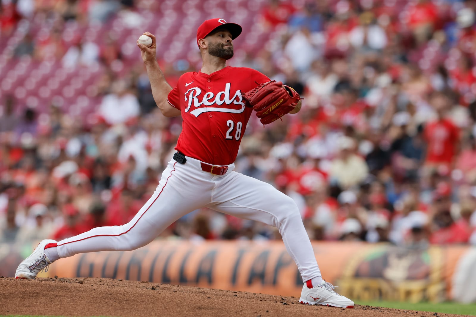 Cincinnati Reds starting pitcher Nick Martinez throws against the Colorado Rockies during the second inning of a baseball game, Sunday, July 13, 2025, in Cincinnati. (AP Photo/Jay LaPrete)