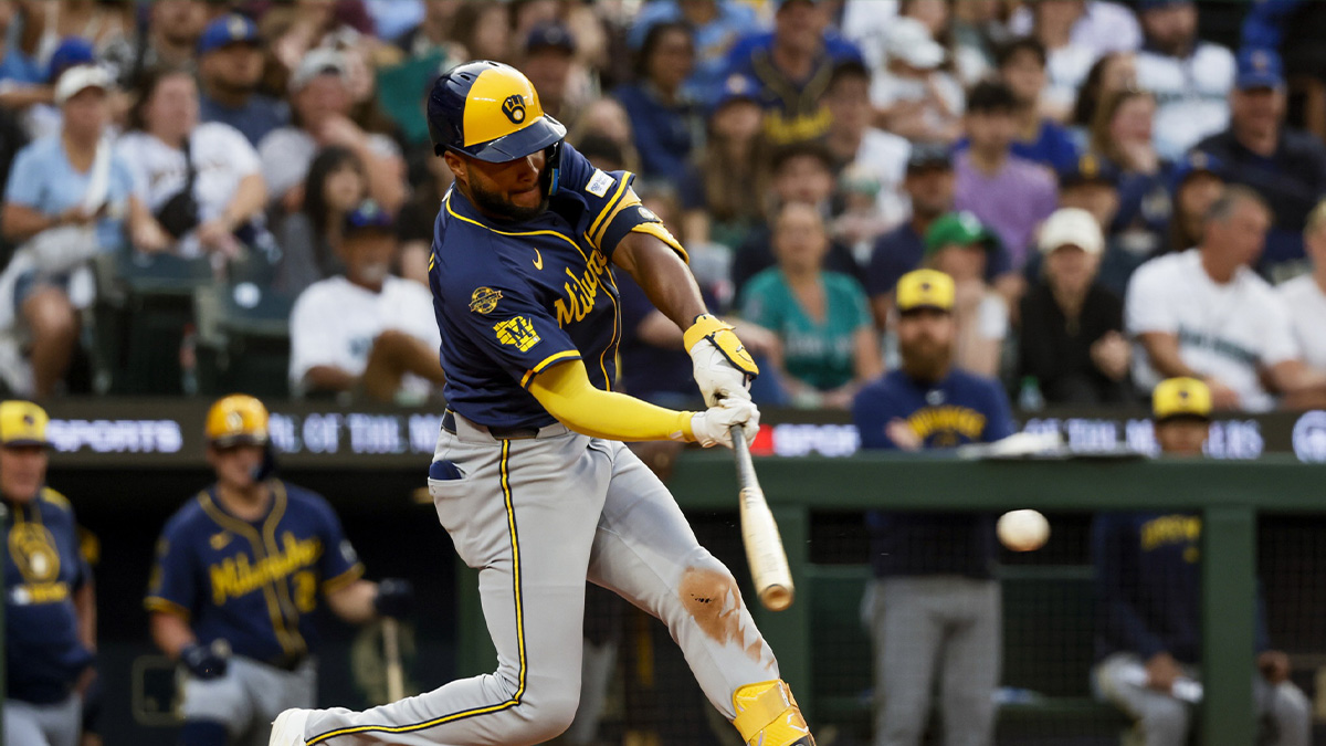 Jul 21, 2025; Seattle, Washington, USA; Milwaukee Brewers right fielder Jackson Chourio (11) hits an RBI-single against the Seattle Mariners during the seventh inning at T-Mobile Park. 