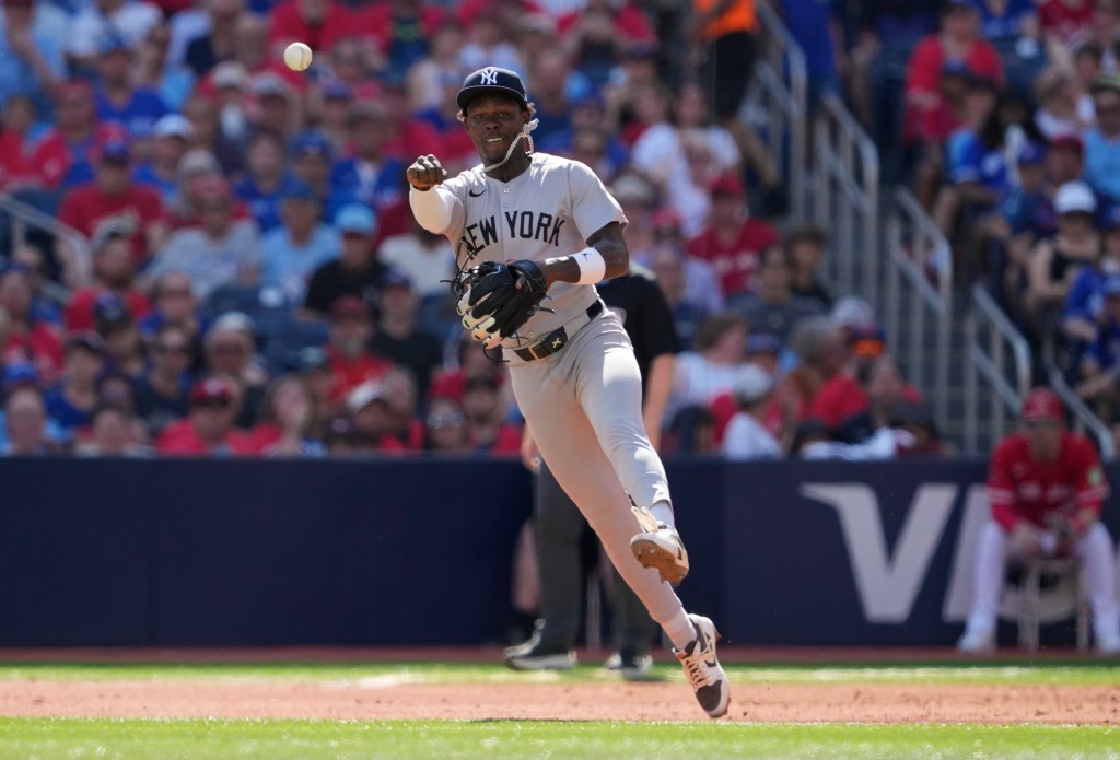 Jazz Chisholm Jr. throws to first base during the Yankees' loss to the Blue Jays on July 1, 2025.
