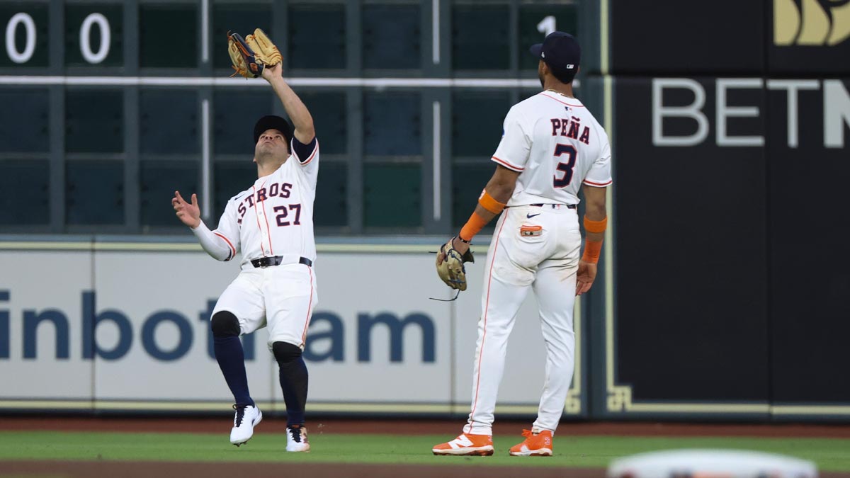Houston Astros left fielder Jose Altuve (27) catches New York Mets right fielder Juan Soto (22) (not pictured) fly ball in the sixth inning at Daikin Park.