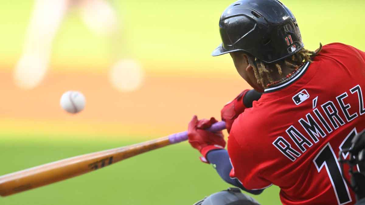 Cleveland Guardians third baseman Jose Ramirez (11) hits a three-run home run in the first inning against the Baltimore Orioles at Progressive Field.
