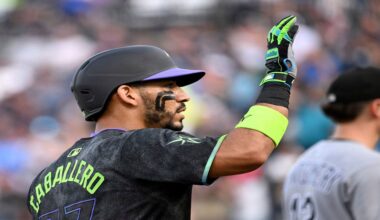 Tampa Bay Rays' José Caballero celebrates after running to third base on a Chicago White Sox error after his single during the second inning of a baseball game Tuesday, July 22, 2025, in Tampa, Fla. (AP Photo/Jason Behnken)