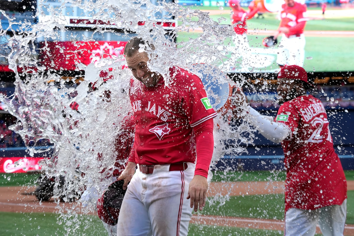 Springer shines as Blue Jays beat Yankees 12-5 to move within one game of AL East lead
