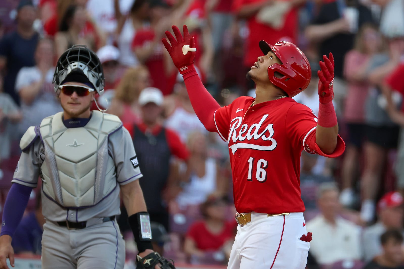 Cincinnati Reds' Noelvi Marte (16) celebrates his home run during the seventh inning of a baseball game against the Colorado Rockies, Saturday, July 12, 2025, in Cincinnati. (AP Photo/Joe Maiorana)