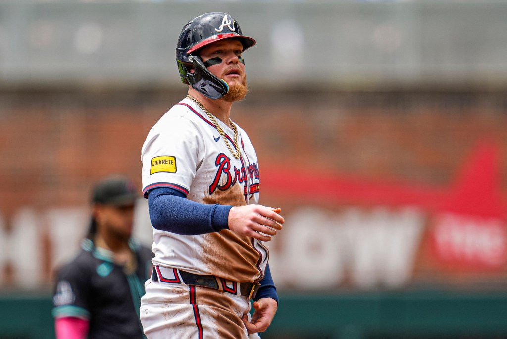 Atlanta Braves left fielder Alex Verdugo (8) shown on second base after hitting a double to drive in a run against the Arizona Diamondbacks during the second inning at Truist Park.