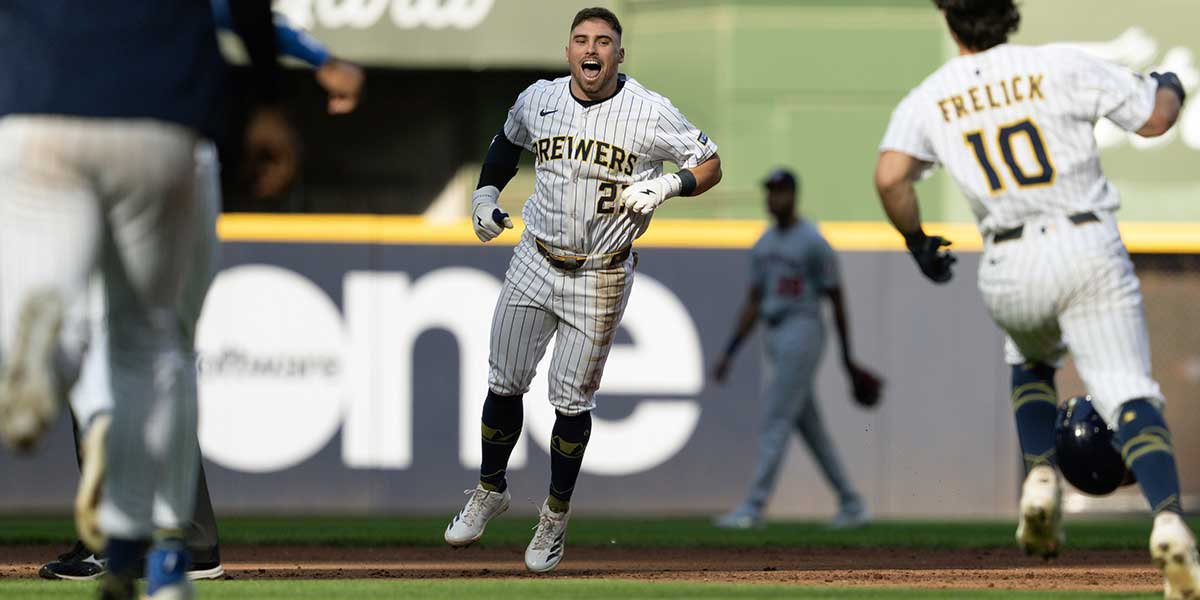Milwaukee Brewers third baseman Caleb Durbin (21) celebrates after driving in the game winning run during the ninth inning against the Washington Nationals at American Family Field.