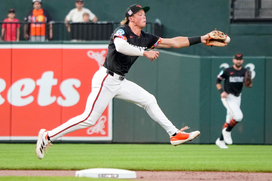 Lighting forces fans to leave their seats, but the Orioles and Rockies play on