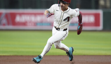 Arizona Diamondbacks' Corbin Carroll advances to third base on a single by Diamondbacks' Geraldo Pe...
