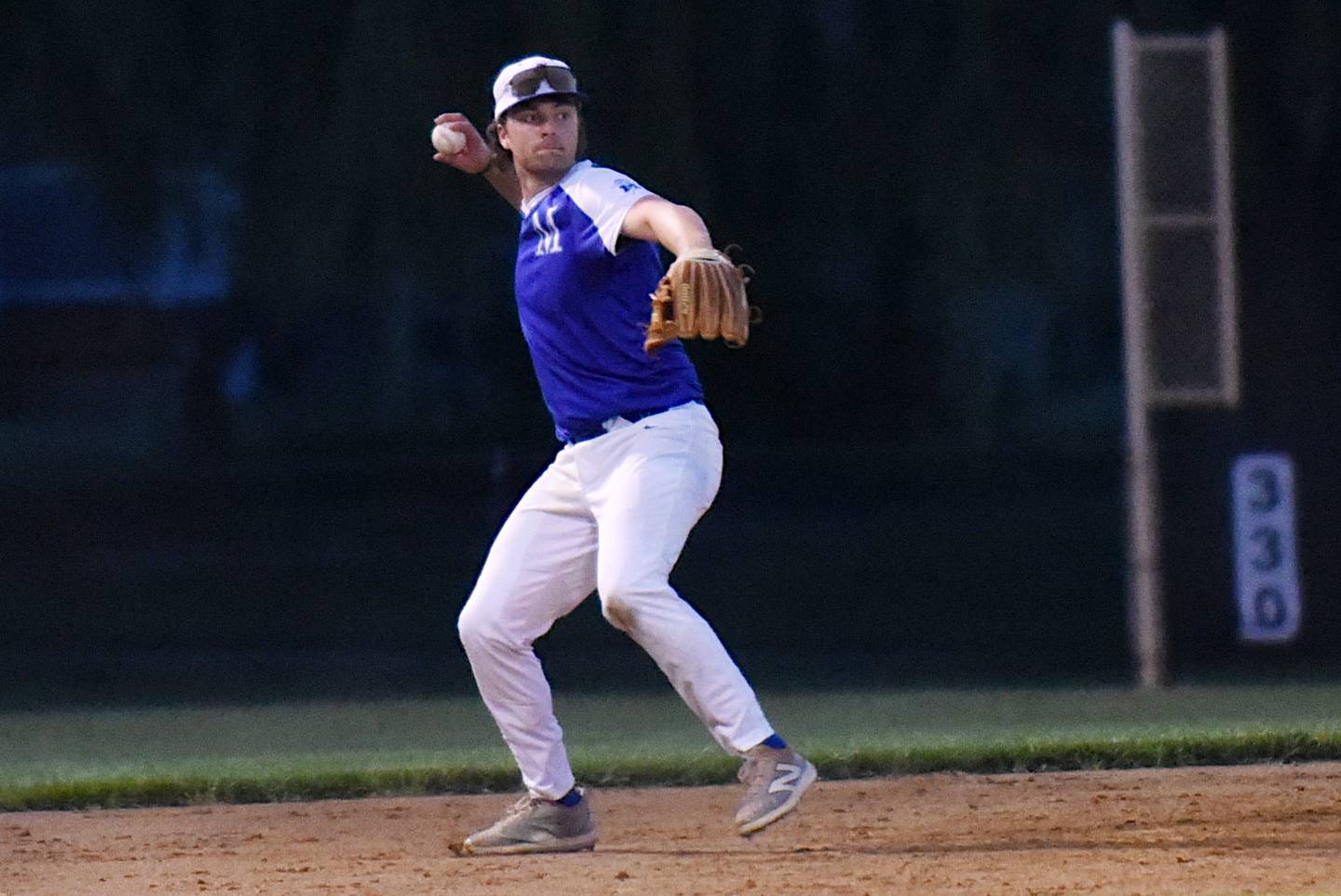 Beecher Muskies' Nolan Czako throws to first base during a Chicago Suburban Baseball League game against the Lombard Orioles at Gouwens Park in South Holland Wednesday, June 25, 2025.