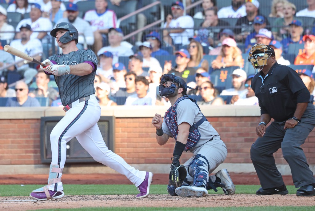 Pete Alonso, who hit two homers in the win, belts a three-run shot in the seventh inning of the Mets' 12-6 victory over the Yankees on July 5, 2025.