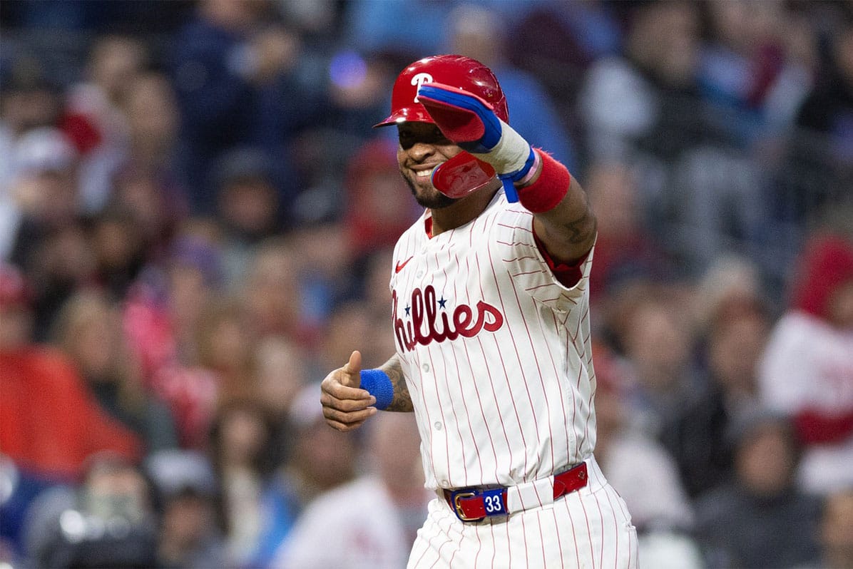 Philadelphia Phillies shortstop Edmundo Sosa (33) reacts after scoring on a bases loaded walk during the fifth inning against the New York Mets at Citizens Bank Park.